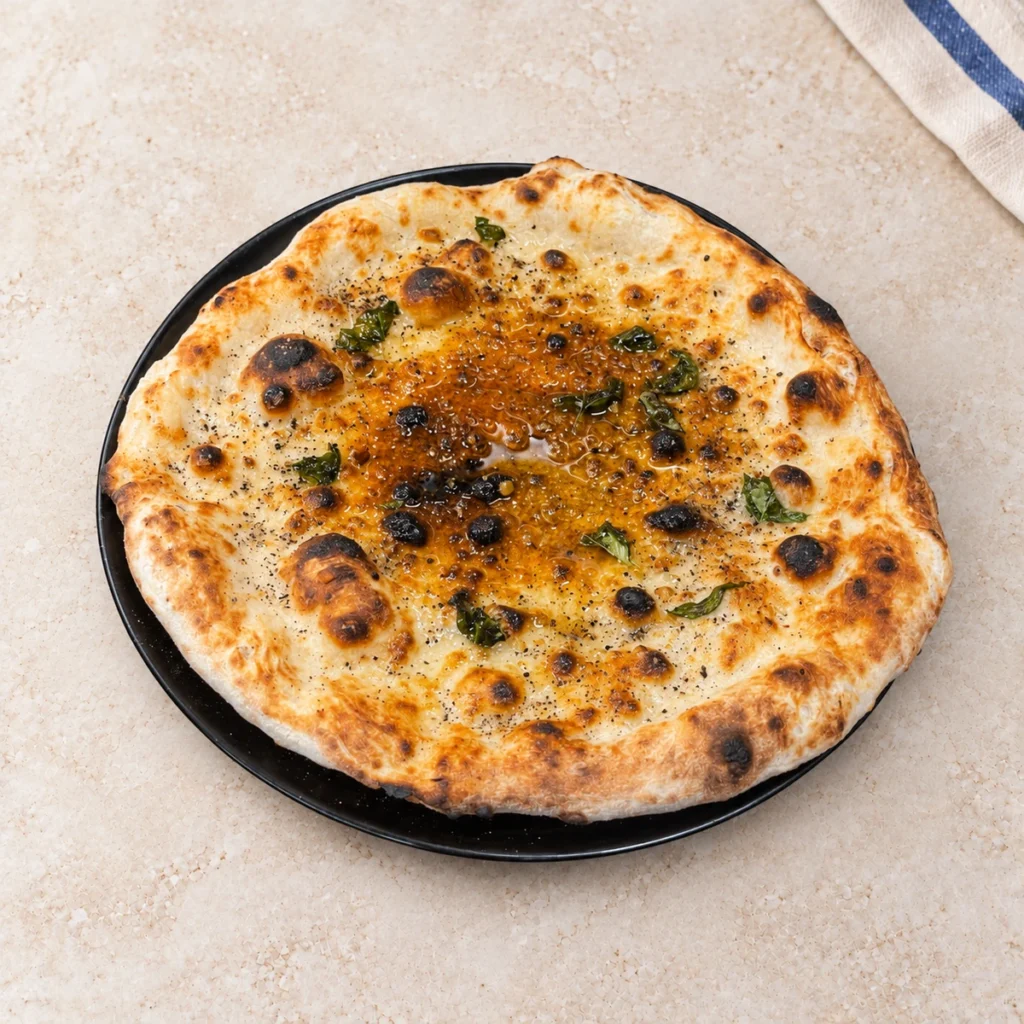 Pizza Mastunicola z bazylią, tartym serem i czarnym pieprzem
