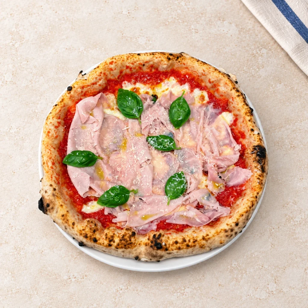 Pizza Prosciutto Cotto z szynką, serem i liśćmi bazylii